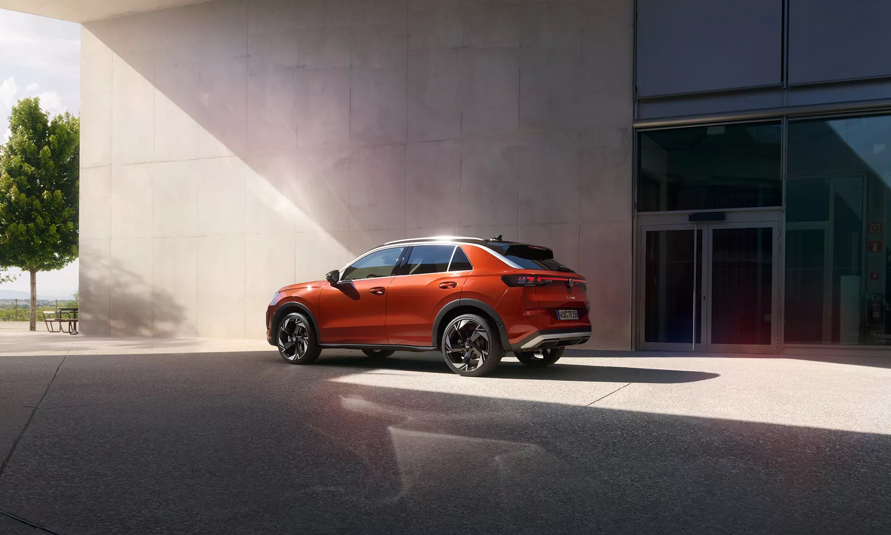 TC1281 Red T Roc Parking Near Building